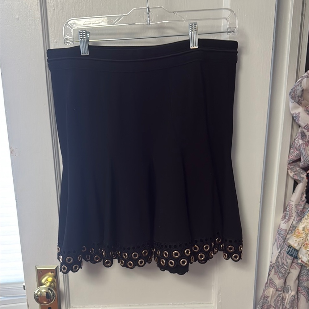 Elegant Black Skirt with Eyelet Hem